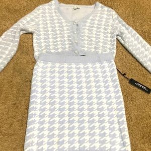 2 piece cropped sweater and skirt. Pink and white with pearls on top.